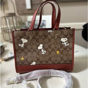 Coach X Peanuts Carryall Dempsey Snoopy and Woodstock.  Signature Canvas